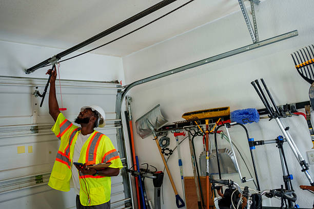 Professional Garage Door Panel Replacement technician working in Gamerco, NM
