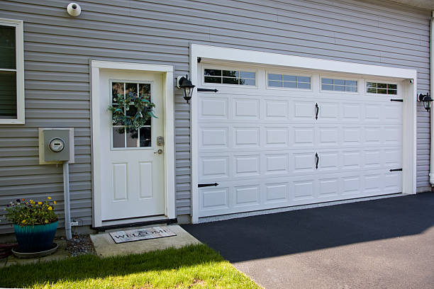 24/7 Emergency Garage Door Panel Replacement experts in Gamerco, NM
